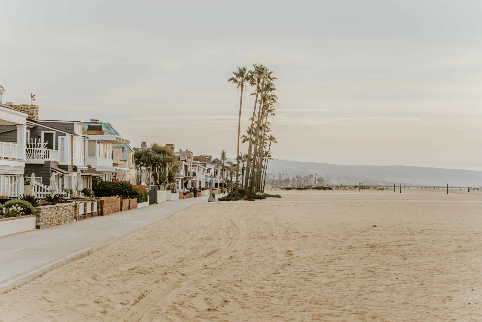 Beachfront vacation homes along the sand in San Diego at golden hour